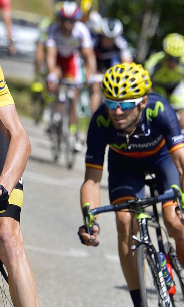 Official: Paris police fired at car trying to crash through Tour de France barricade